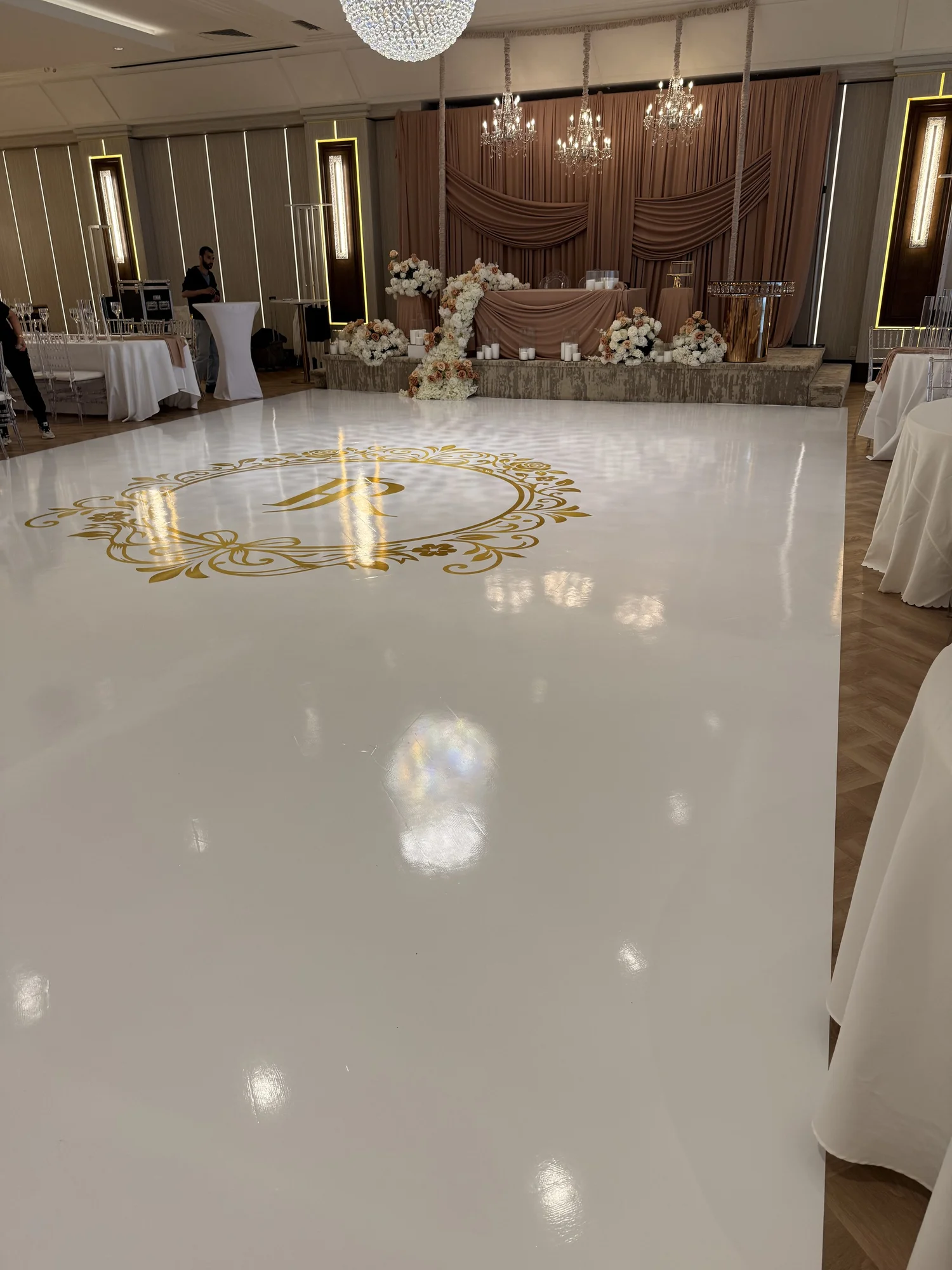Gold-accented monogram dance floor